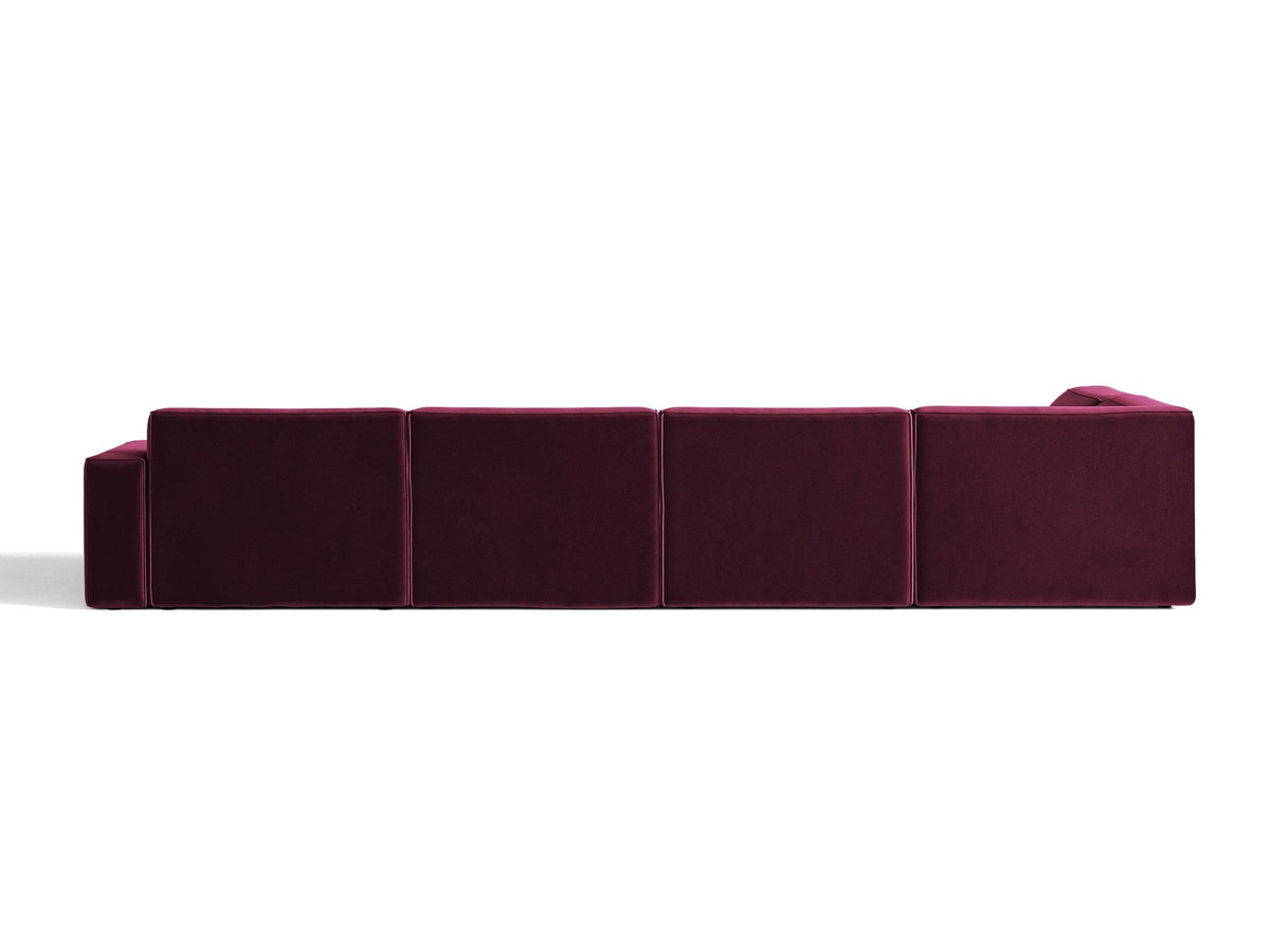 Modulares Ecksofa links Jodie von Micadoni in leichtem Beige mit Venus-Samtstoff, schwarzen Kunststoffbeinen und Panoramaform.