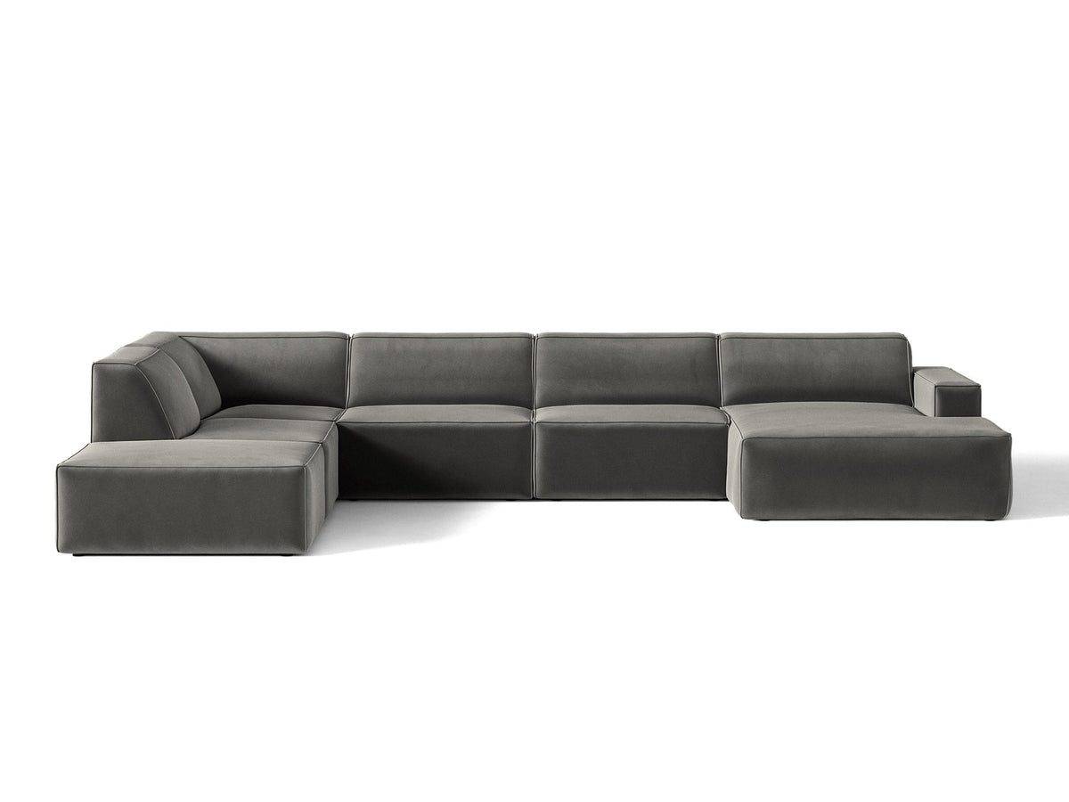 Modulares Ecksofa links Jodie von Micadoni in leichtem Beige mit Venus-Samtstoff, schwarzen Kunststoffbeinen und Panoramaform.