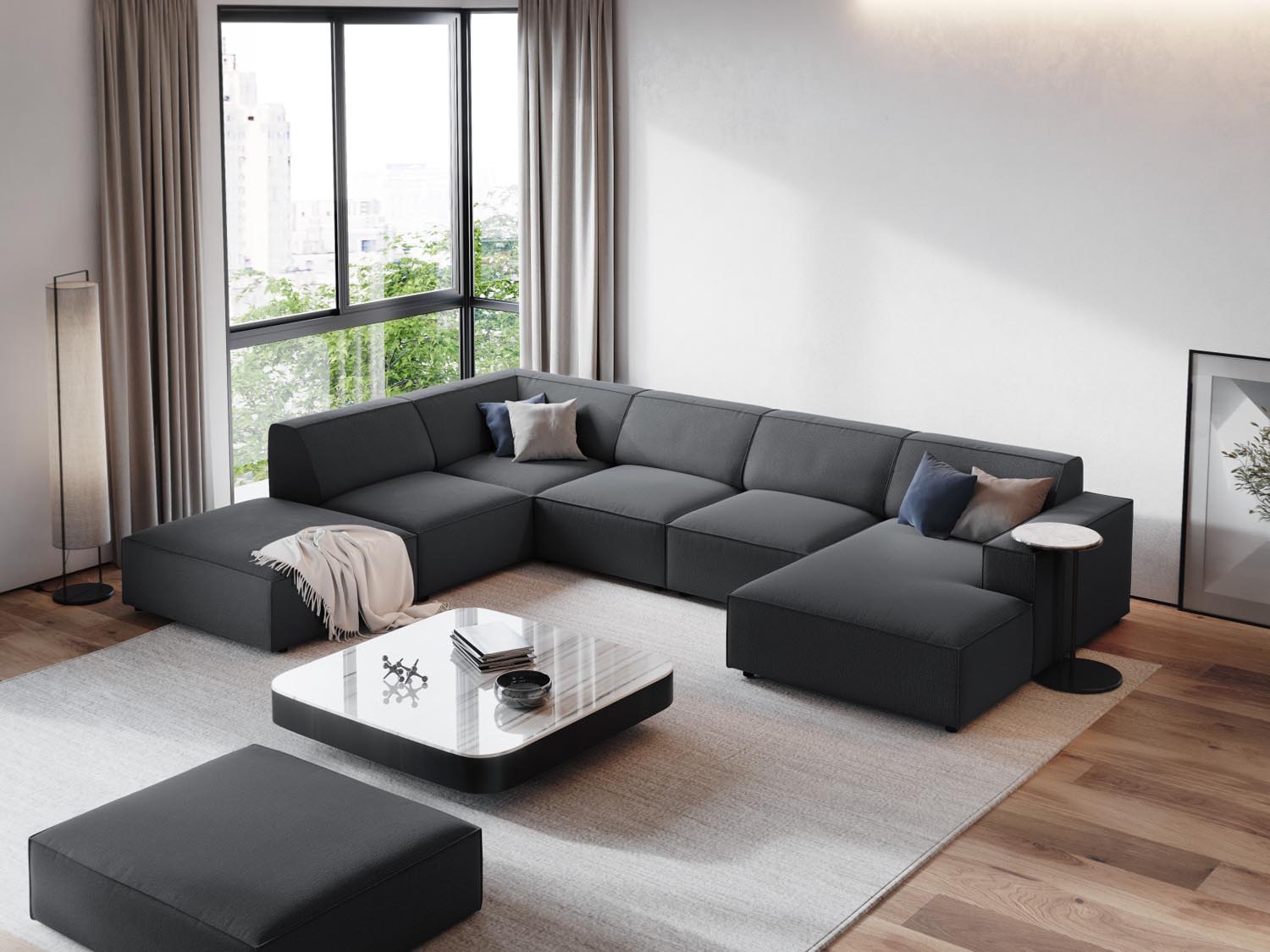 Stylisches, modulares 7-Sitzer Ecksofa Jodie in Dunkelgrau, ideal für moderne Wohnräume, präsentiert in einladender Atmosphäre.