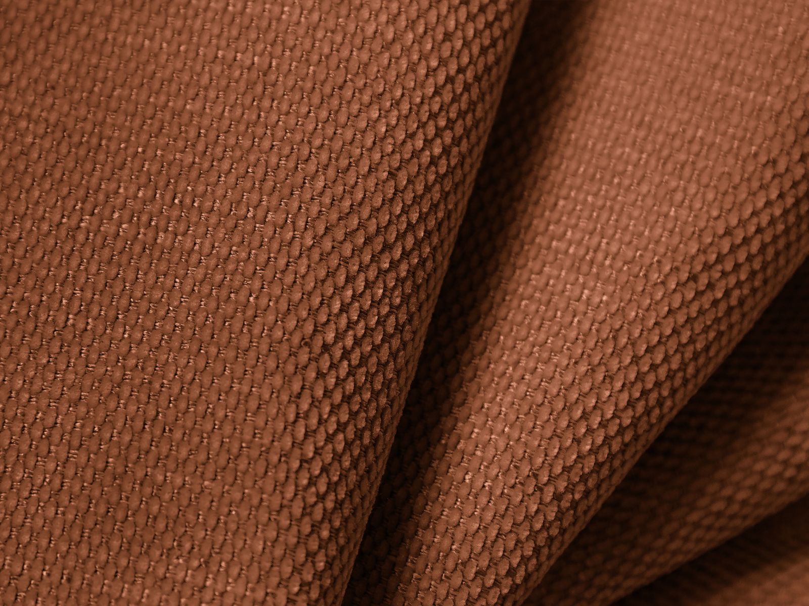 Stilvolles 6-Sitzer Ecksofa Molino in ansprechendem Orange, ideal für gemütliche Wohnräume, entworfen von Micadoni.