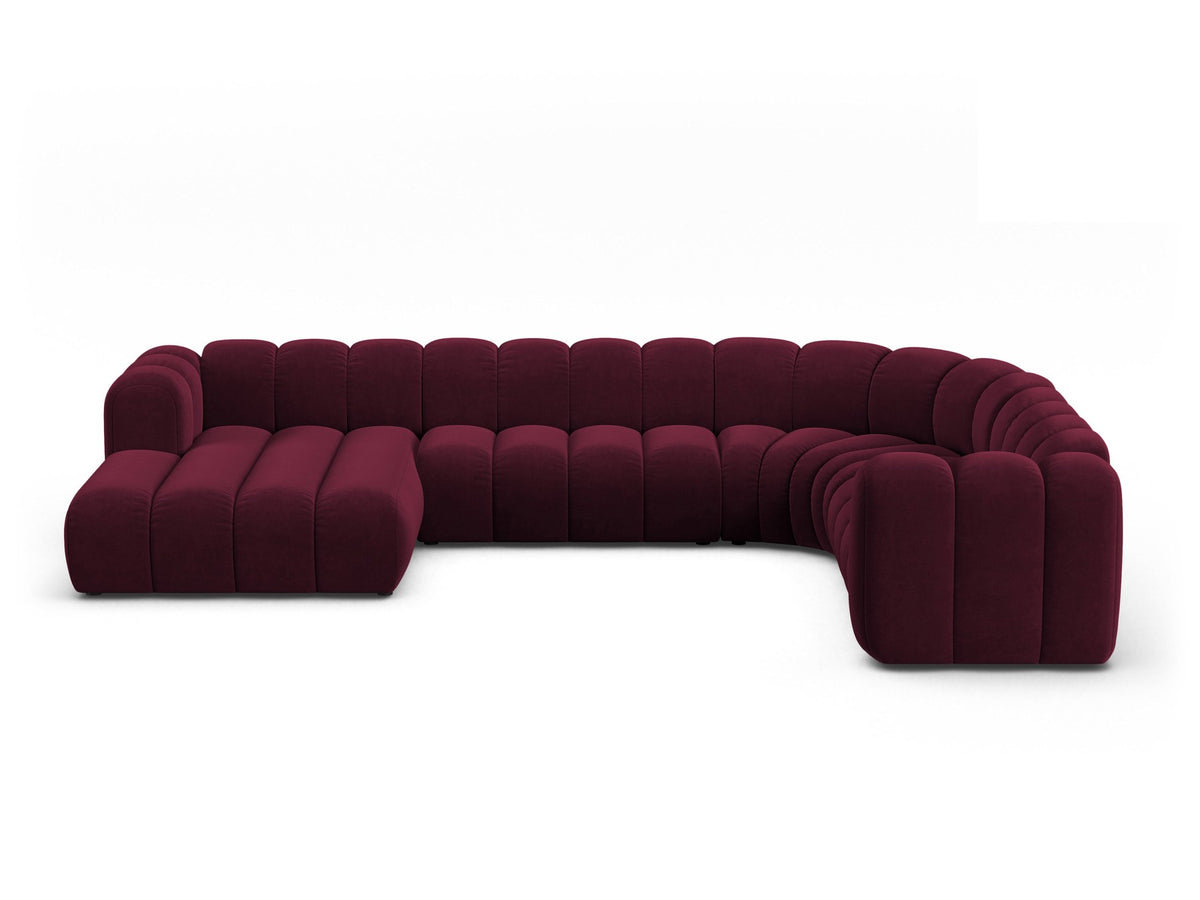 Ecksofa rechts Lupine Modulares Panoramasofa von Micadoni in leichtem Beige, Samtstoff Venus, schwarze Kunststoffbeine, Frontansicht.