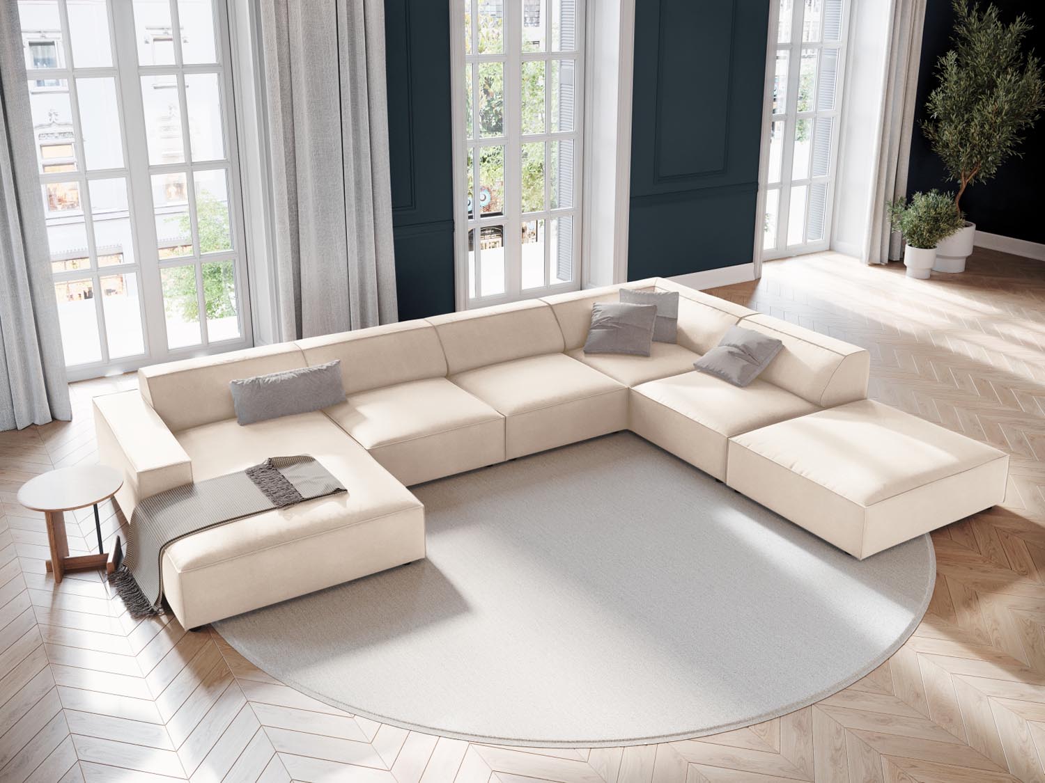 Elegantes, modulares Ecksofa Jodie in Light Beige-Bluvel, ideal für stilvolle Wohnräume, präsentiert in einer einladenden Atmosphäre.