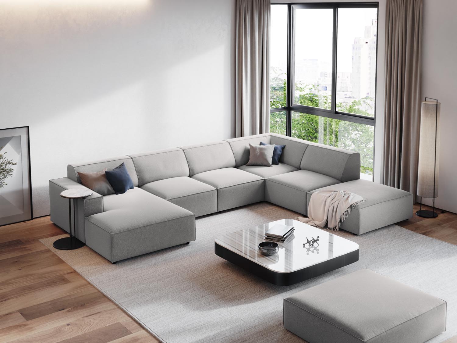 Elegantes, modulares Ecksofa in hellem Grau, ideal für stilvolle Wohnräume. Komfortables 7-Sitzer-Design von Micadoni.