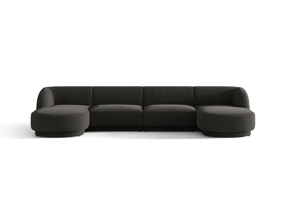Dunkelbeiges Panorama-Ecksofa Miley von Micadoni mit Bluvel-Stoffbezug, L-Form, schwarzen Kunststoffbeinen und niedriger Rückenlehne.