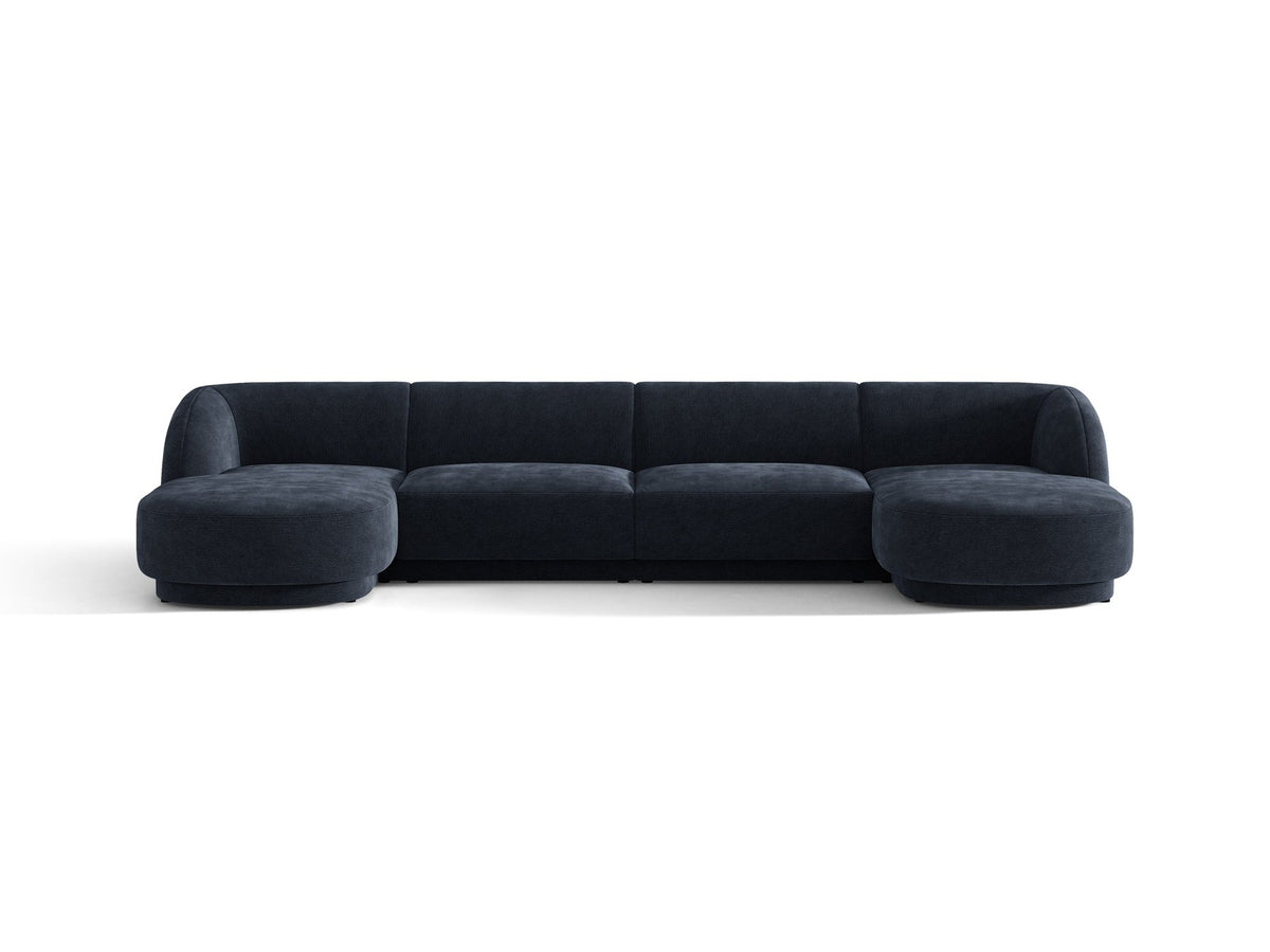 Dunkelbeiges Panorama-Ecksofa Miley von Micadoni mit Bluvel-Stoffbezug, L-Form, schwarzen Kunststoffbeinen und niedriger Rückenlehne.