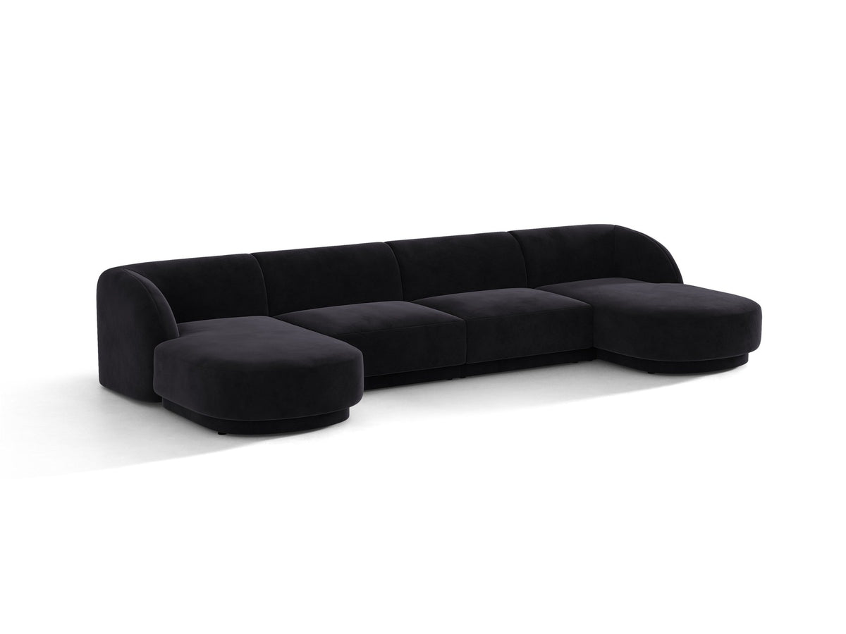 Dunkelbeiges Panorama-Ecksofa Miley von Micadoni mit Bluvel-Stoffbezug, L-Form, schwarzen Kunststoffbeinen und niedriger Rückenlehne.