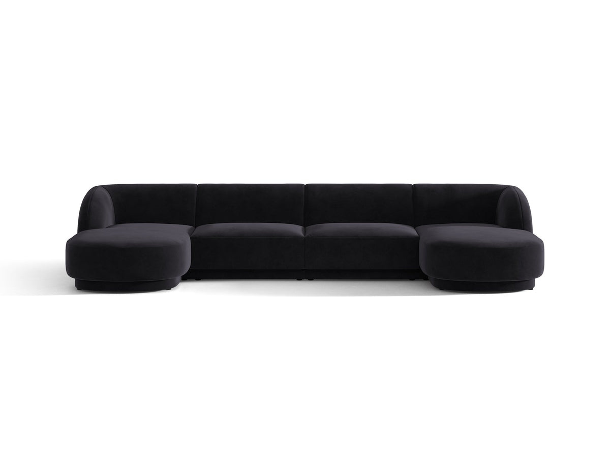 Dunkelbeiges Panorama-Ecksofa Miley von Micadoni mit Bluvel-Stoffbezug, L-Form, schwarzen Kunststoffbeinen und niedriger Rückenlehne.
