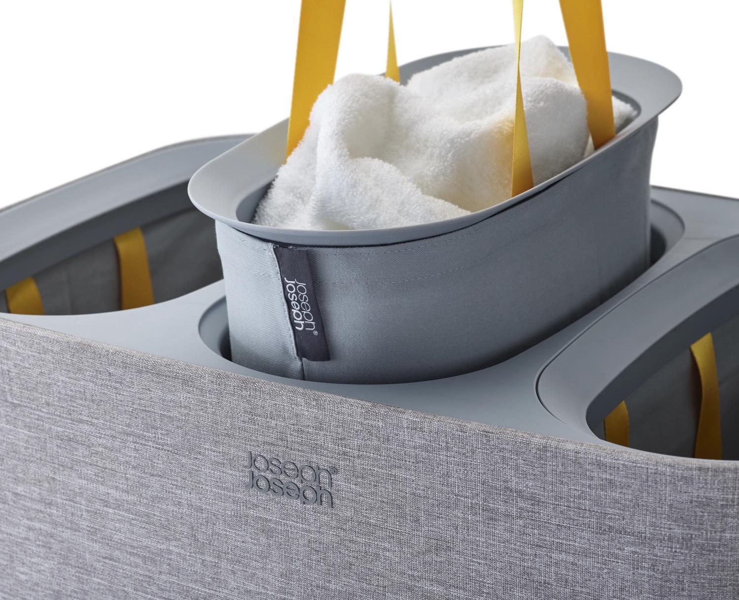 Moderner Wäschekorb mit 3x30L Kapazität, ideal zum Sortieren. Graues Design, funktional und elegant von Joseph Joseph.