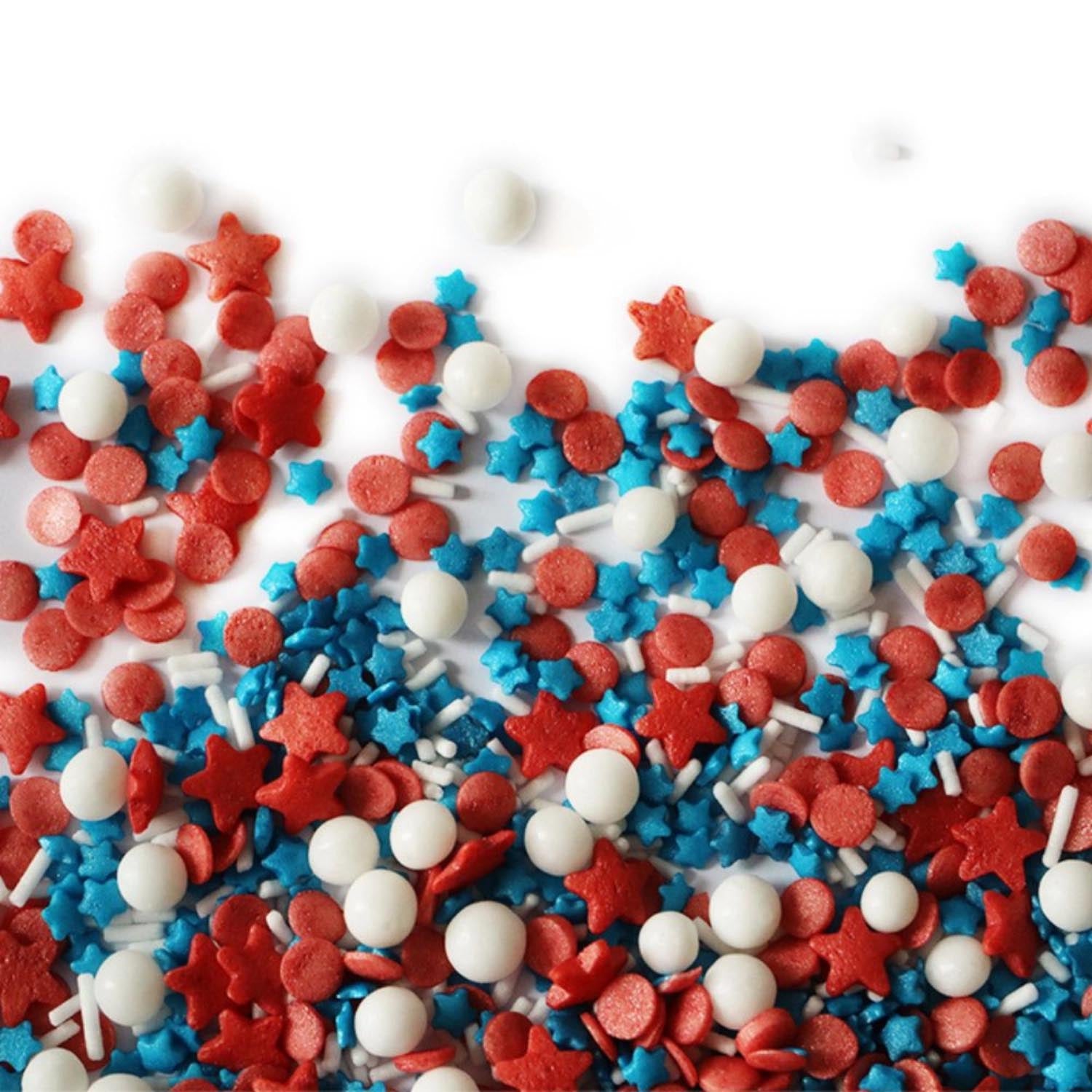 Zuckerstreussel blau, weiss, rot 50g in Mehrfarbig präsentiert im Onlineshop von KAQTU Design AG. Lebensmittel ist von Scrap Cooking