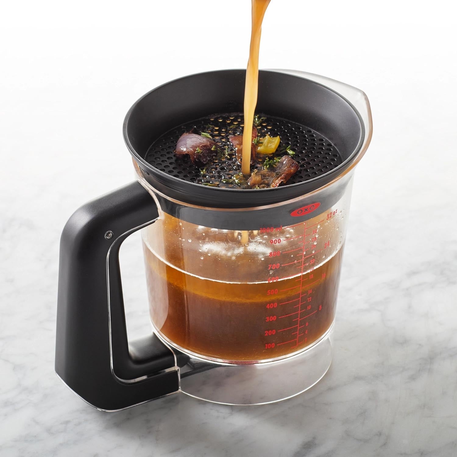 Der OXO Good Grips Fetttrenner 1L ermöglicht müheloses Trennen von Fett und Flüssigkeit, ideal für Saucen und Brühen, mit praktischem Design.