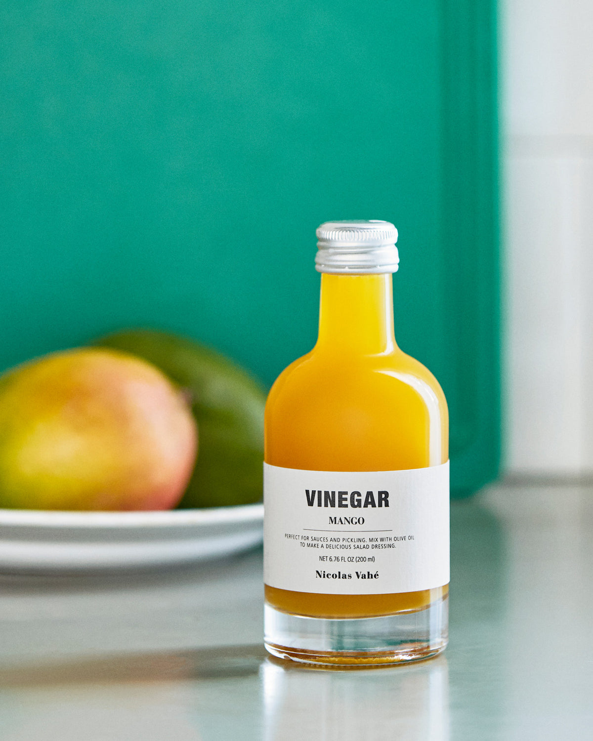 Essig, Mango in Schwarz präsentiert im Onlineshop von KAQTU Design AG. Lebensmittel ist von Nicolas Vahé