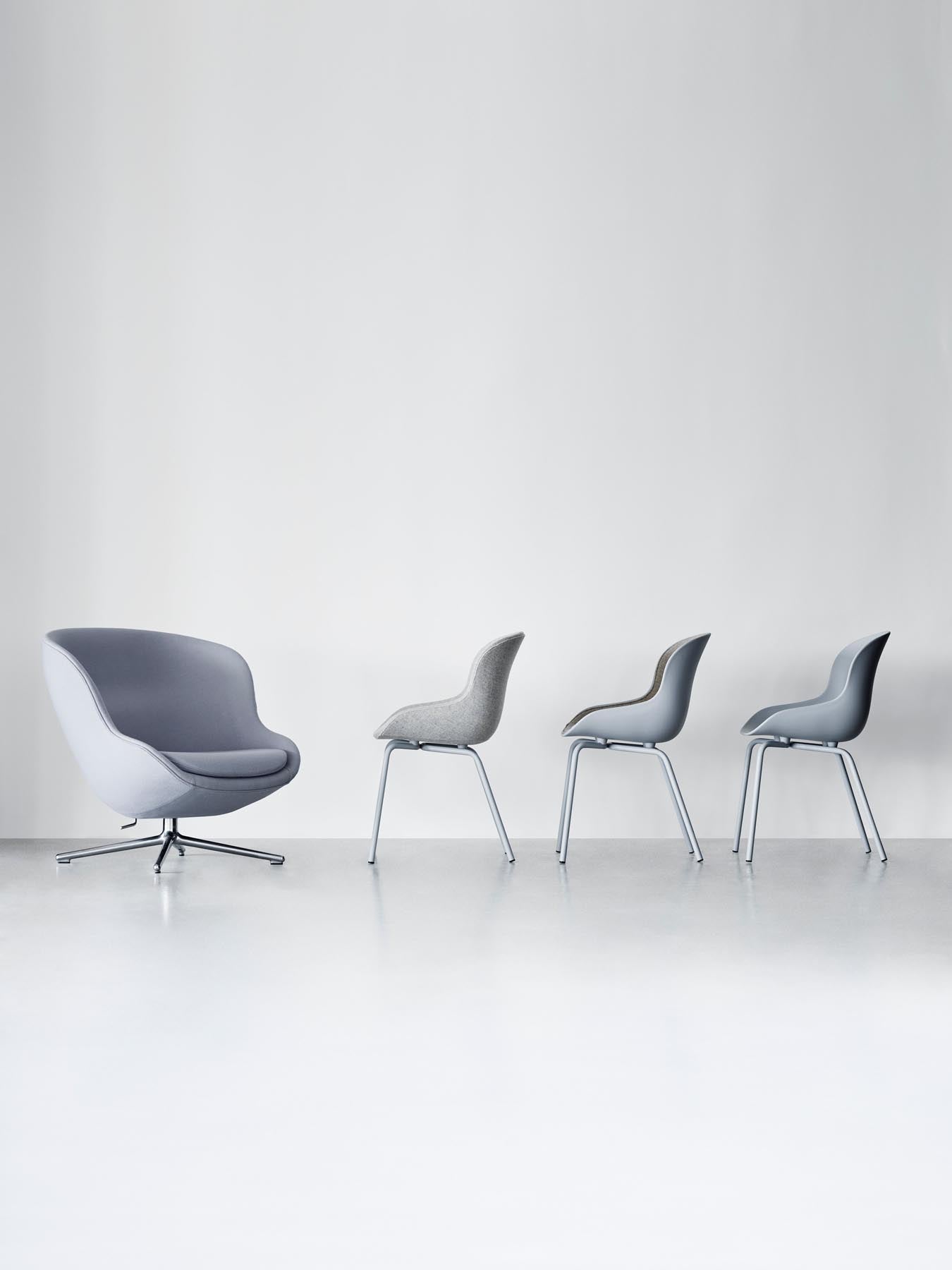 Der Hyg Stuhl von Normann Copenhagen: Sanfte Linien, umhüllende Konturen, inspiriert von dänischer Hygge für Gemütlichkeit und Wärme.