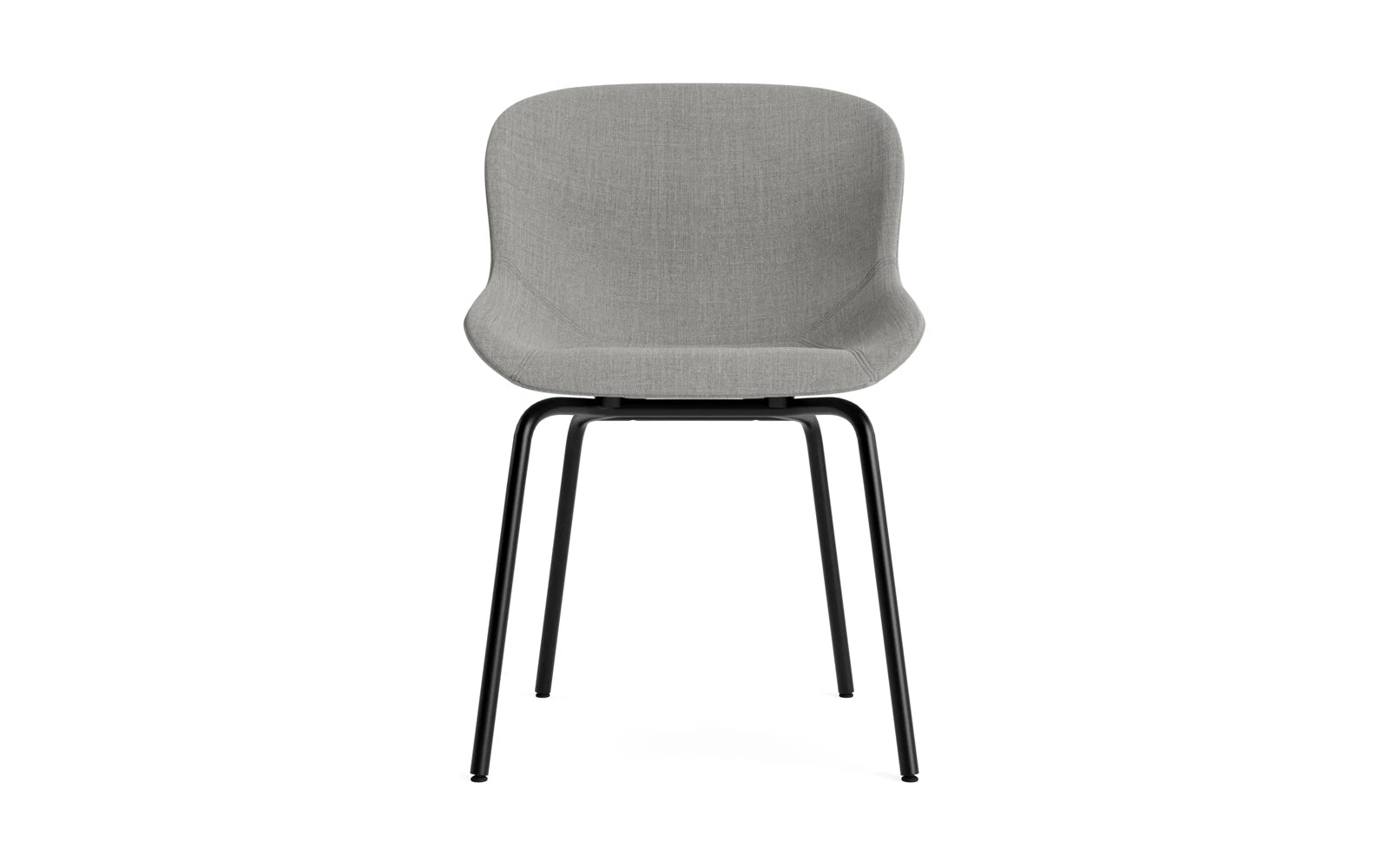 Der Hyg Stuhl von Normann Copenhagen vereint dänische Hygge mit sanften Linien und gemütlicher Polsterung. Wählbar in Stoff oder Leder.