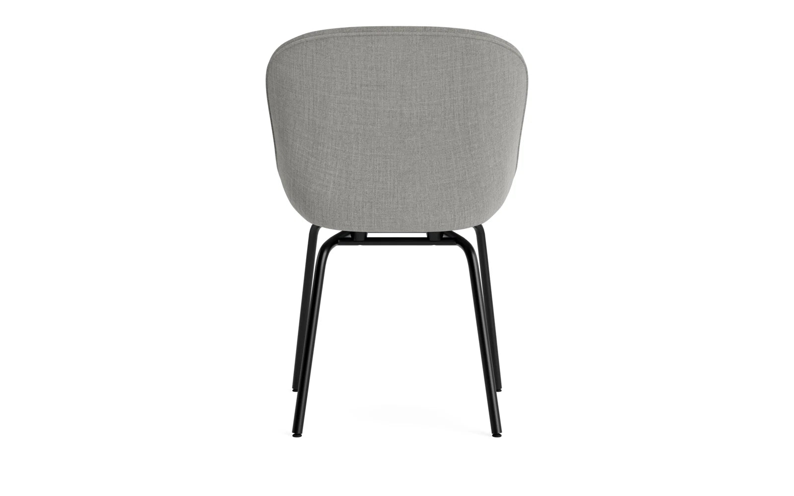 Der Hyg Stuhl von Normann Copenhagen vereint dänische Hygge mit sanften Linien und gemütlicher Polsterung. Wählbar in Stoff oder Leder.