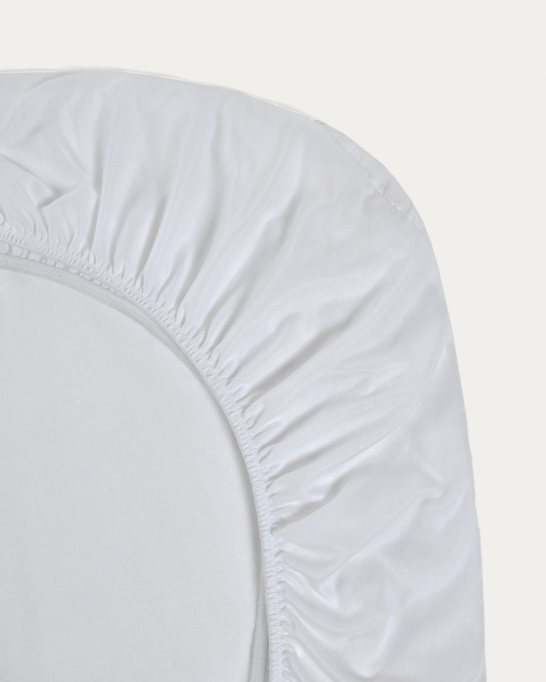Jasleen Matratzenschoner aus 100% Baumwolle, 60x120 cm, ideal für Gitterbetten, von Kave Home, bietet Schutz und angenehmen Komfort.