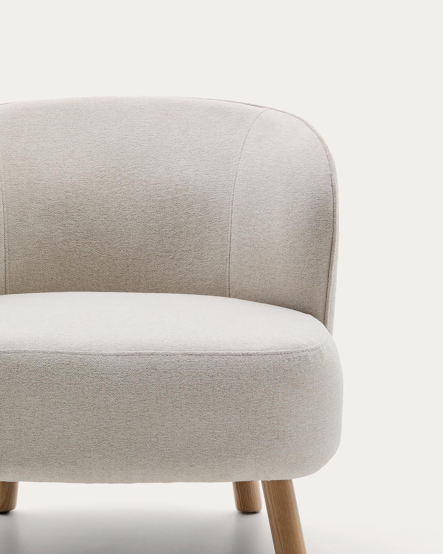 Armchair from beveled chenille and legs made of solid beech wood with natural