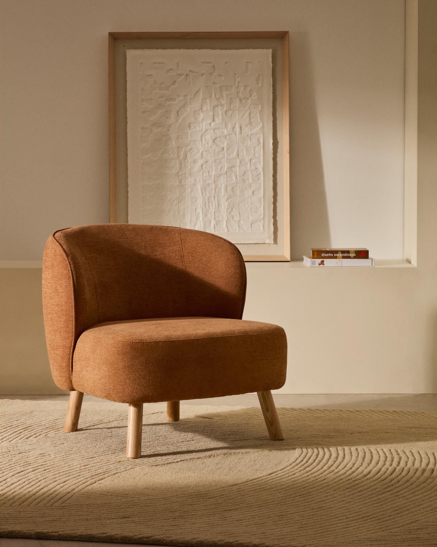 Ulit armchair made of terracotta<tc>ott</tc>a-colored chenille and legs made of solid beech wood with natural