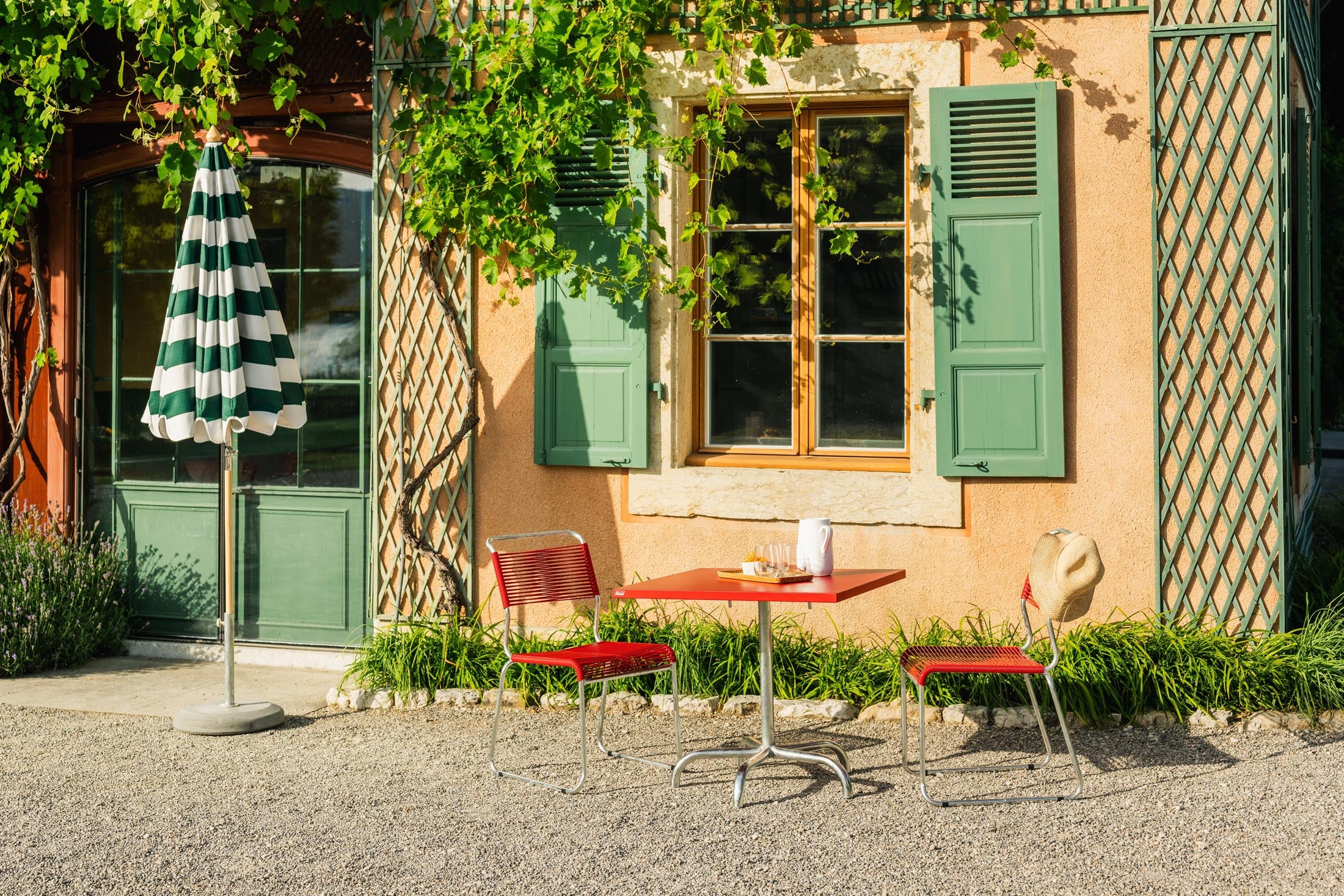 Spaghettistuhl Säntis mit Kufen in Rot präsentiert im Onlineshop von KAQTU Design AG. Gartenstuhl ist von Schaffner