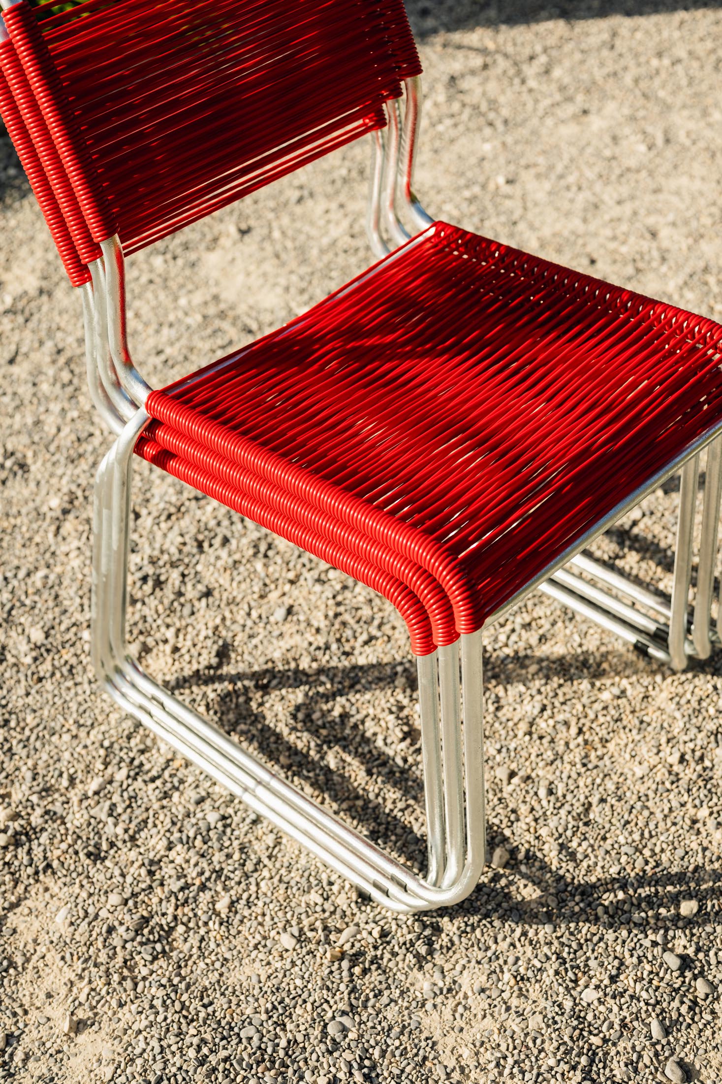 Spaghettistuhl Säntis mit Kufen in Rot präsentiert im Onlineshop von KAQTU Design AG. Gartenstuhl ist von Schaffner