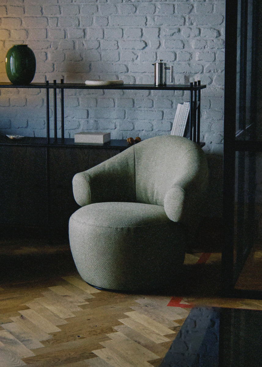 Eleganter Drehsessel Conva RPS01 von Tamo, mit geschmackvollem Design und bequemer Polsterung, perfekt für stilvolle Wohnräume.
