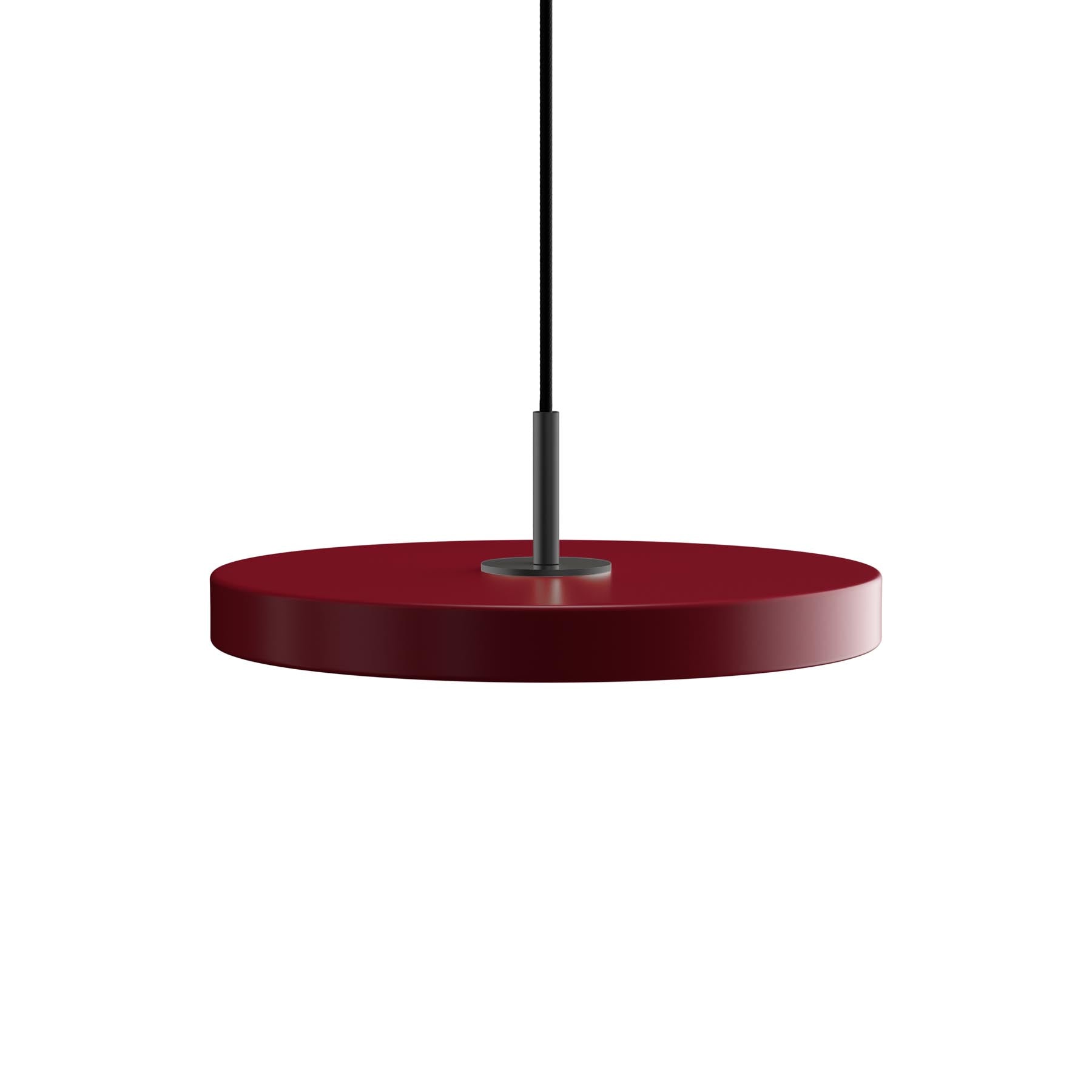 Elegante Asteria Mini Pendellampe in Saffron Yellow, ideal für moderne Innenräume und stimmungsvolle Beleuchtungseffekte.
