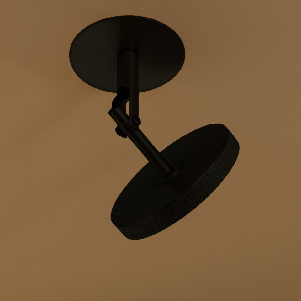 Elegante Asteria Spot Wandleuchte in Schwarz, ideal für kreative Lichtgestaltung und stilvolle Akzente in jedem Raum.
