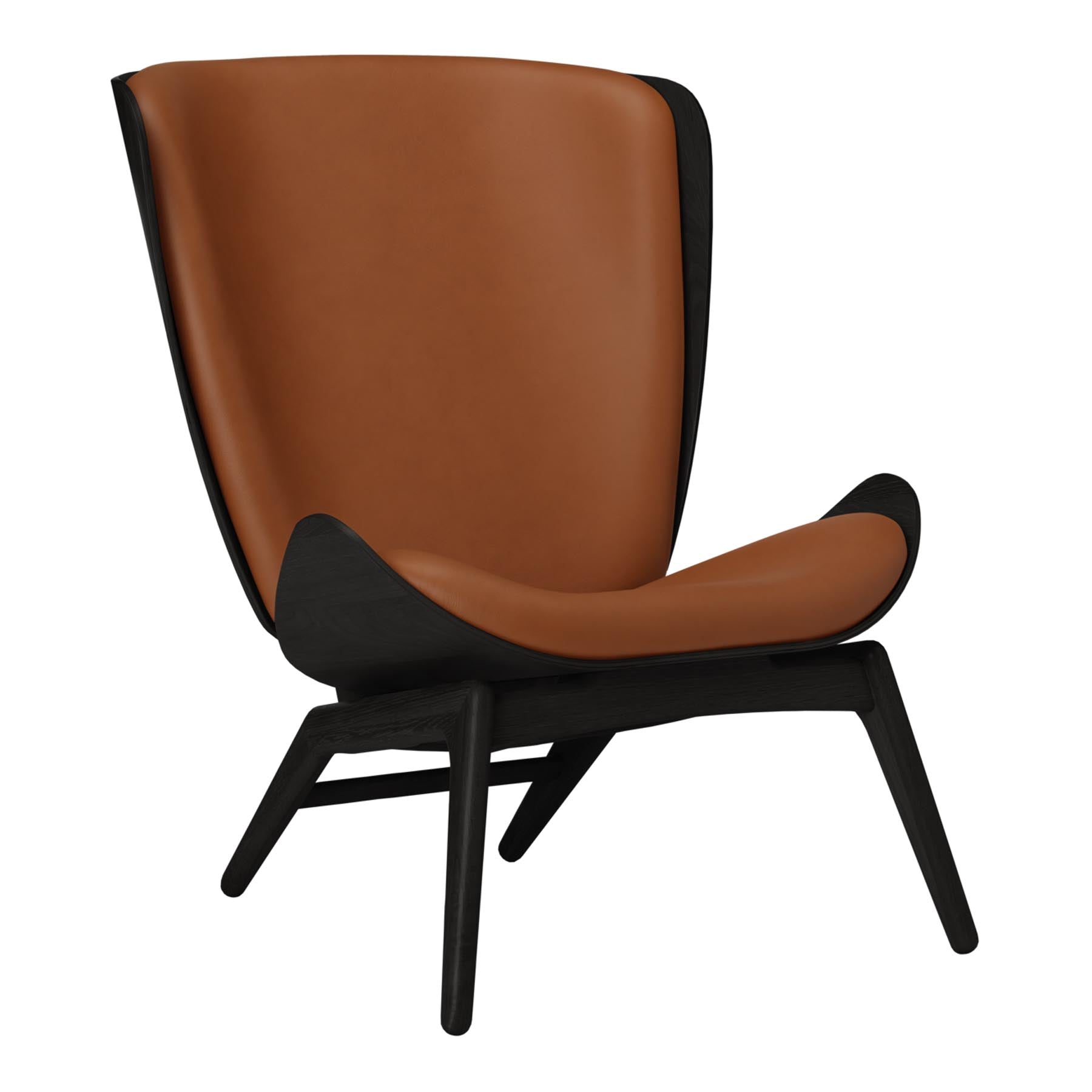 Eleganter Reader Sessel von Umage, ideal für gemütliche Leseecken. Hochwertige Materialien und ansprechende Form bieten Komfort und Stil.