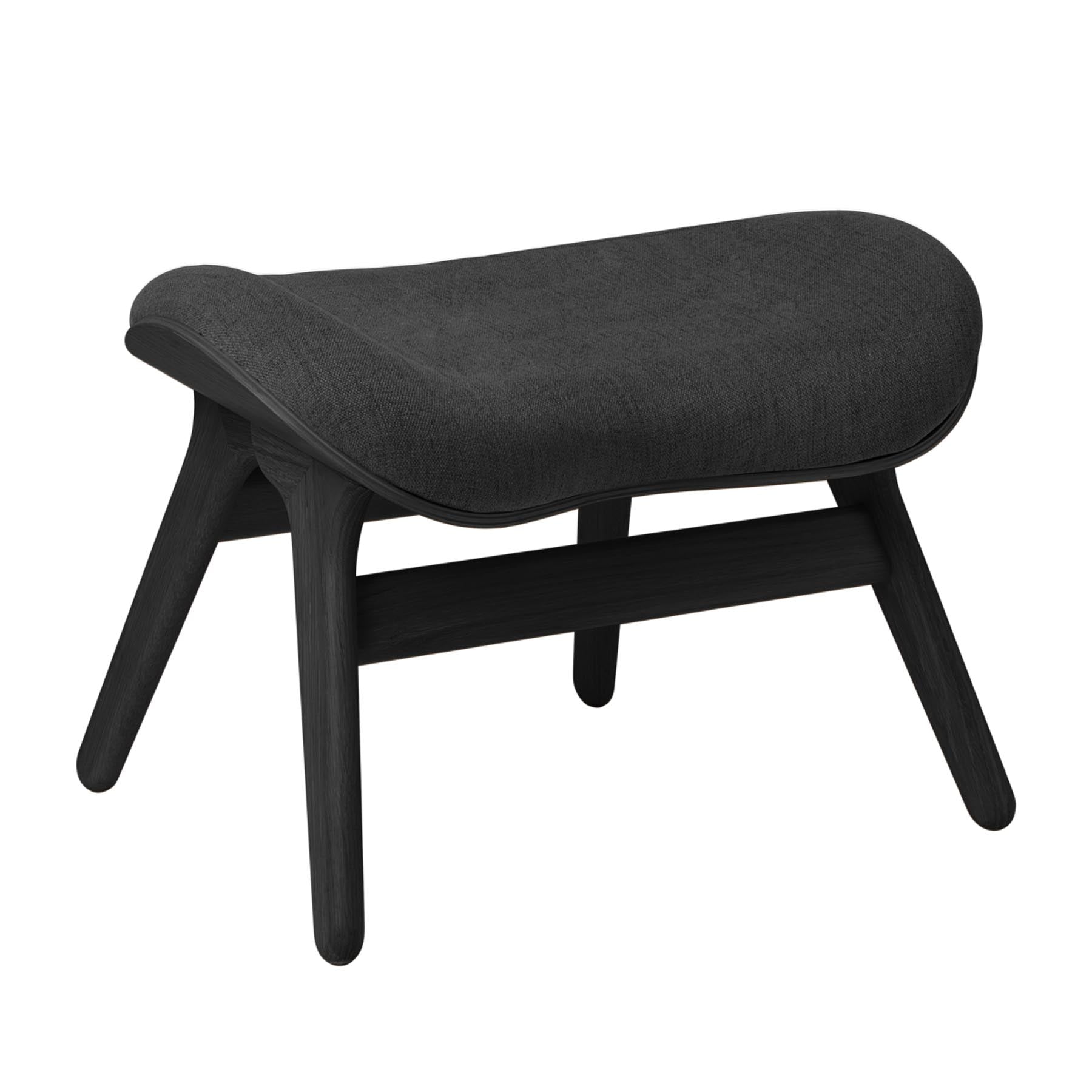Stylischer A Conversation Piece Ottoman in Shadow, perfekt für kreative Wohnräume und als Blickfang in jedem Zuhause.