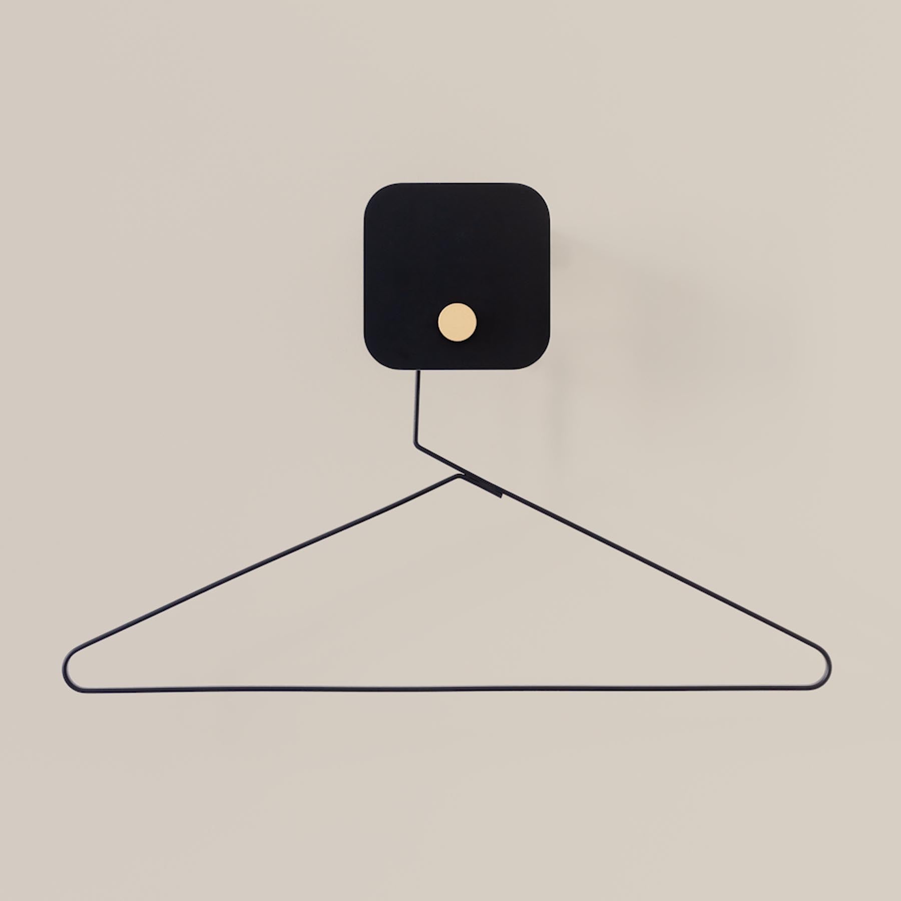 Stylischer Hang In There Kleiderhaken in Schwarz von Umage, ideal für moderne Wohnräume und funktionale Aufbewahrungslösungen.