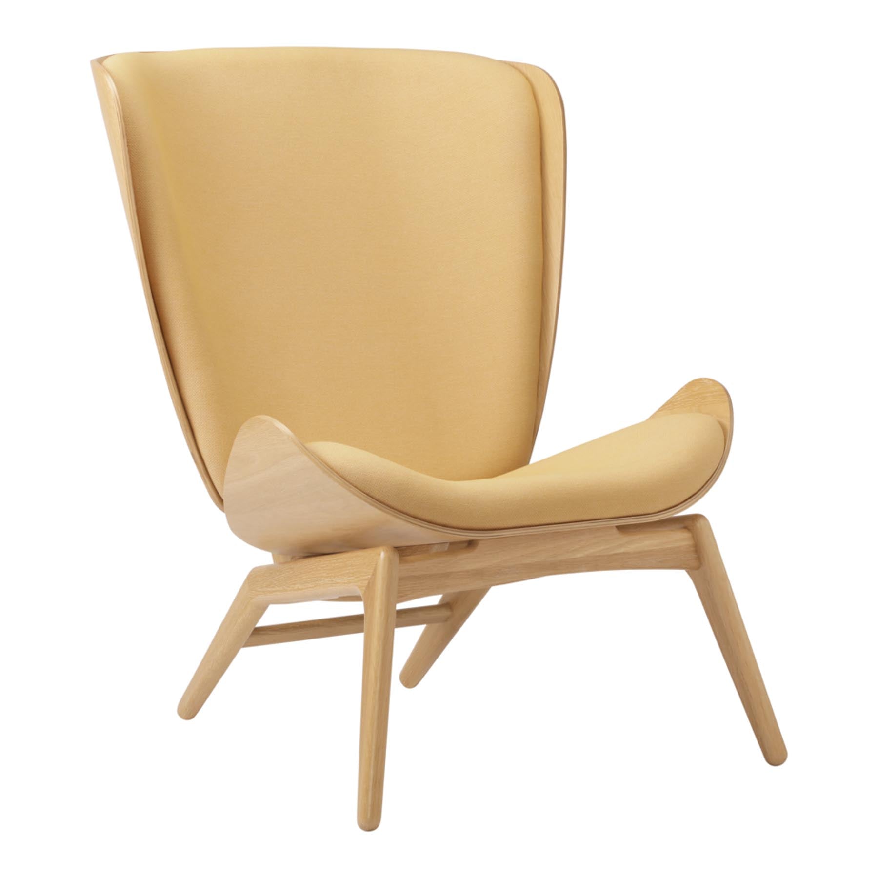 Eleganter Reader Sessel von Umage, ideal für stilvolle Wohnräume und gemütliche Leseecken, vereint Komfort und modernes Design.