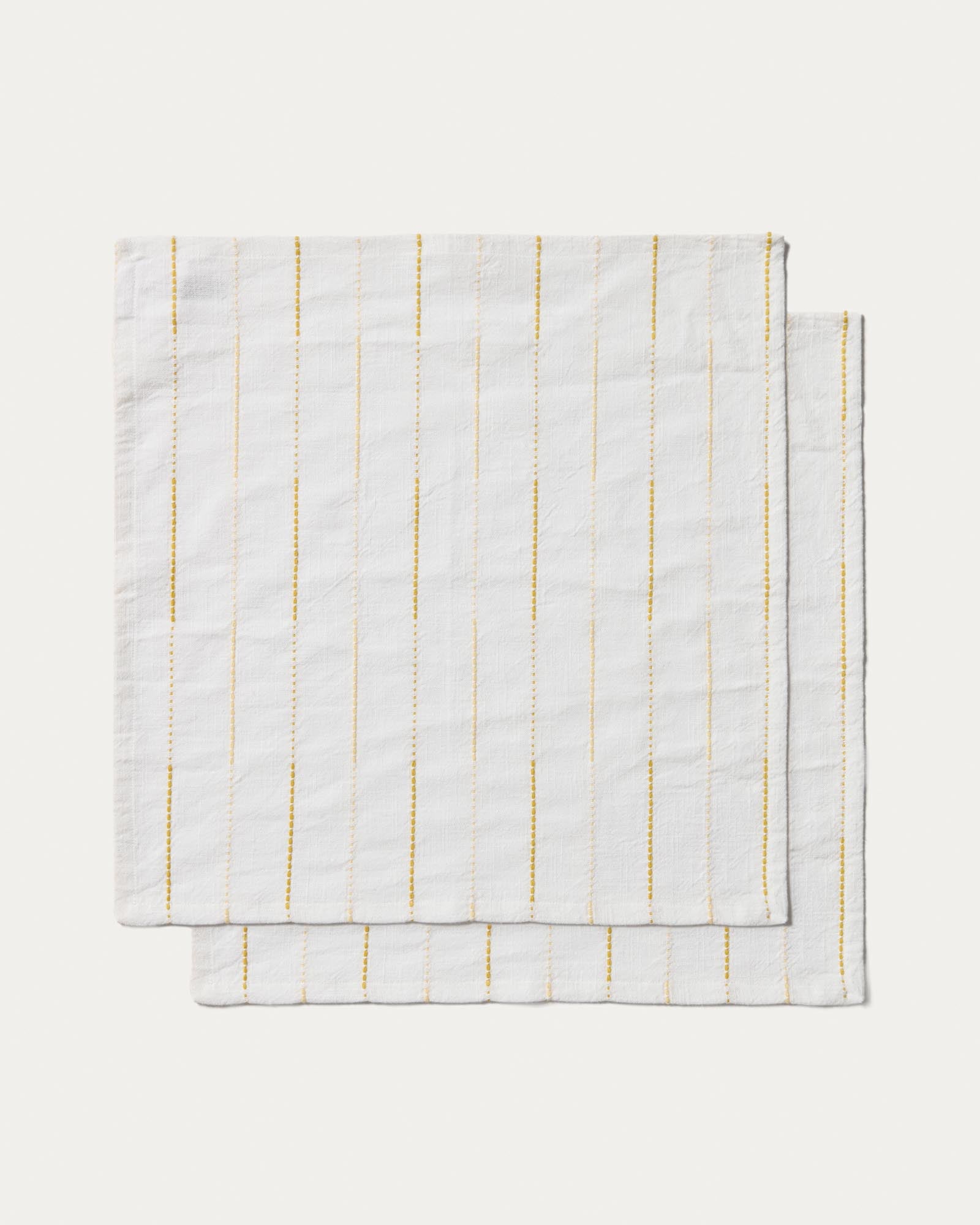 Set Anila mit 2 Servietten aus Baumwolljacquard in Gelb, 35 x 35 cm in Weiss präsentiert im Onlineshop von KAQTU Design AG. Tischdecke ist von Kave Home