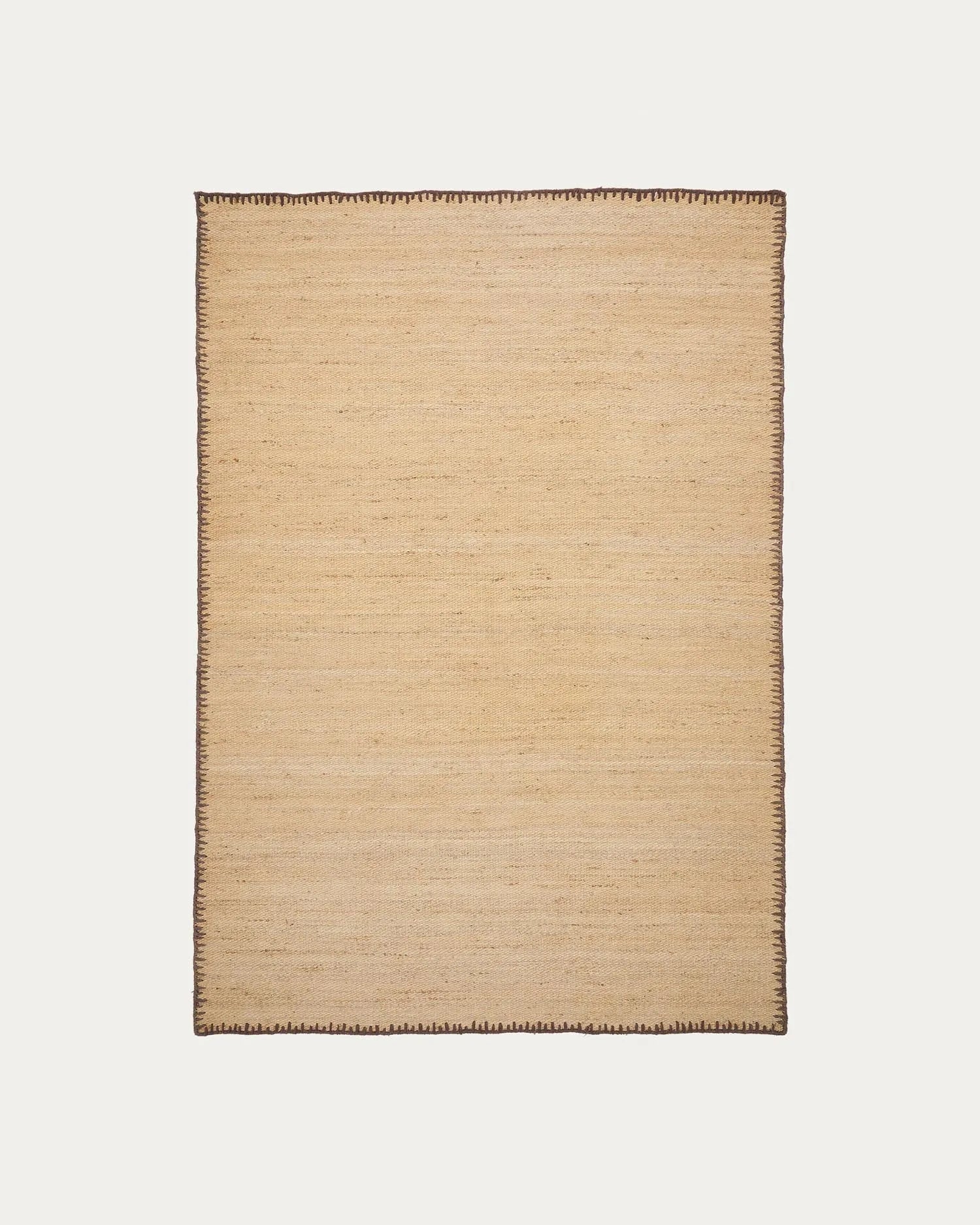 Sorina Jute-Teppich, 160x230 cm, naturfarben mit braunem Rand. Nachhaltig, stilvoll und ideal für jeden Raum.