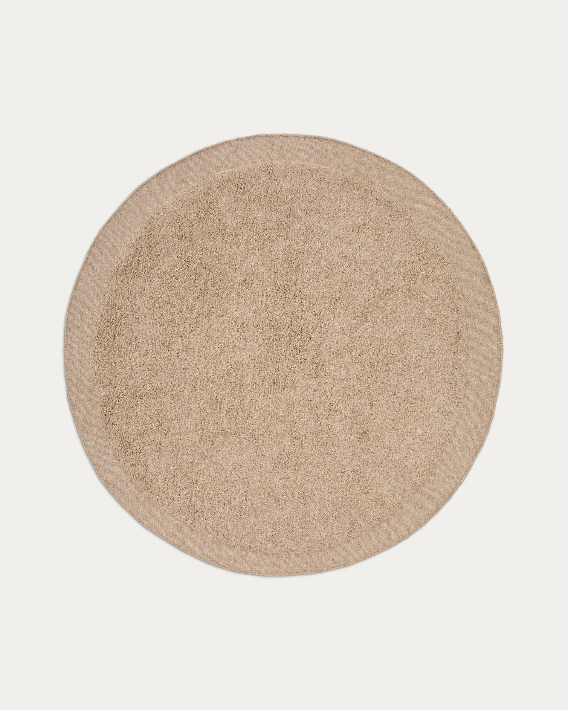 Runder Teppich Marely aus Wolle in Beige, Ø 200 cm, von Kave Home. Stilvoll, hochwertig und perfekt für jedes Zuhause.