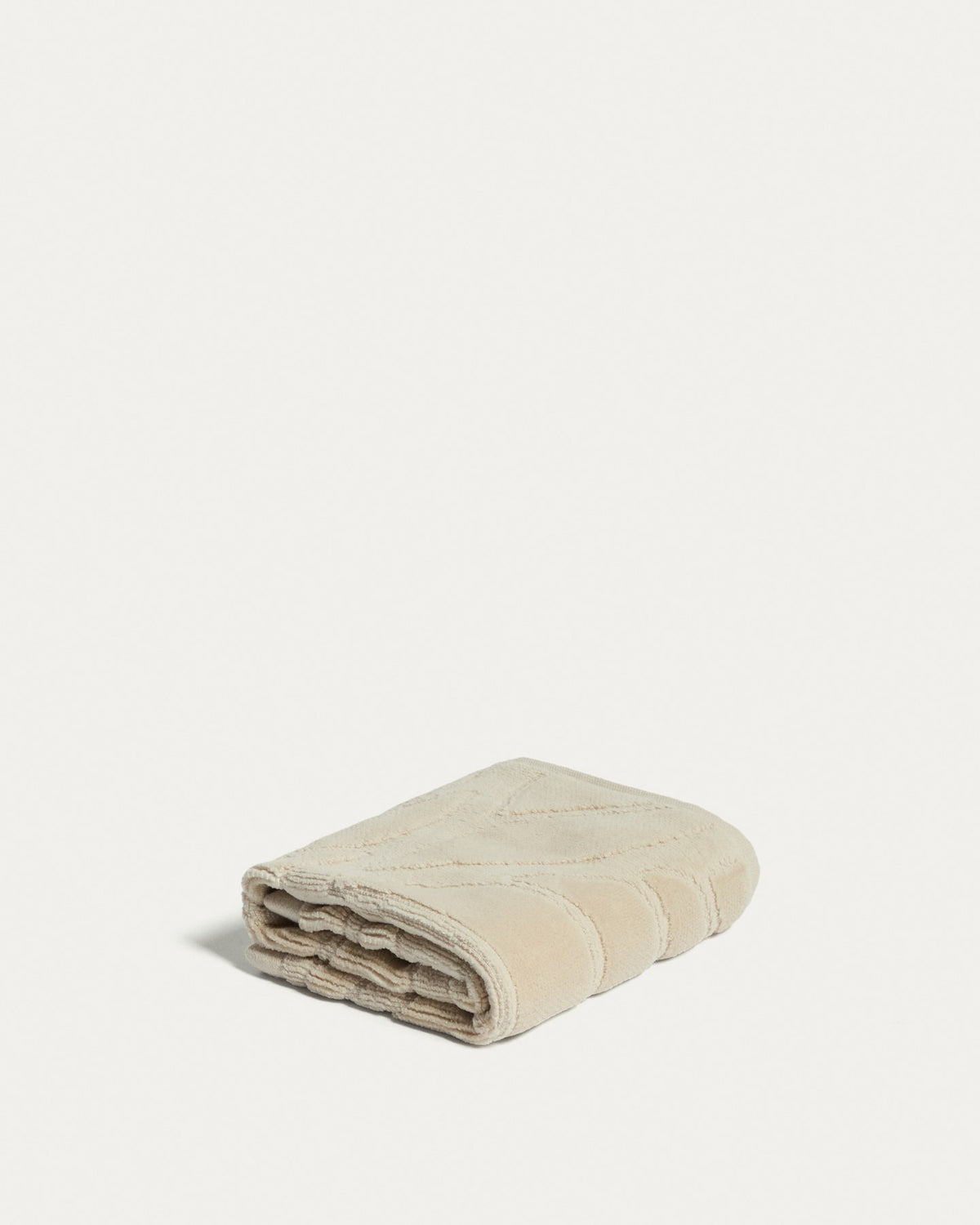 Beiges Toilettenhandtuch Lurevi aus 100 % Baumwollgewebe mit Jacquard-Muster und samtiger Oberfläche, Grösse 30 x 50 cm.