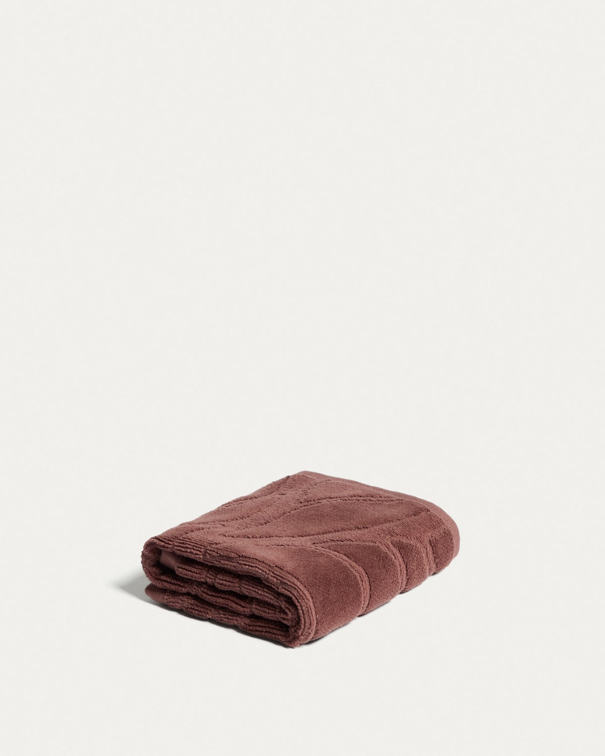 Weinrotes Toilettenhandtuch aus 100% Baumwolle mit Jacquard-Muster und samtiger Oberfläche, Format 30 x 50 cm.