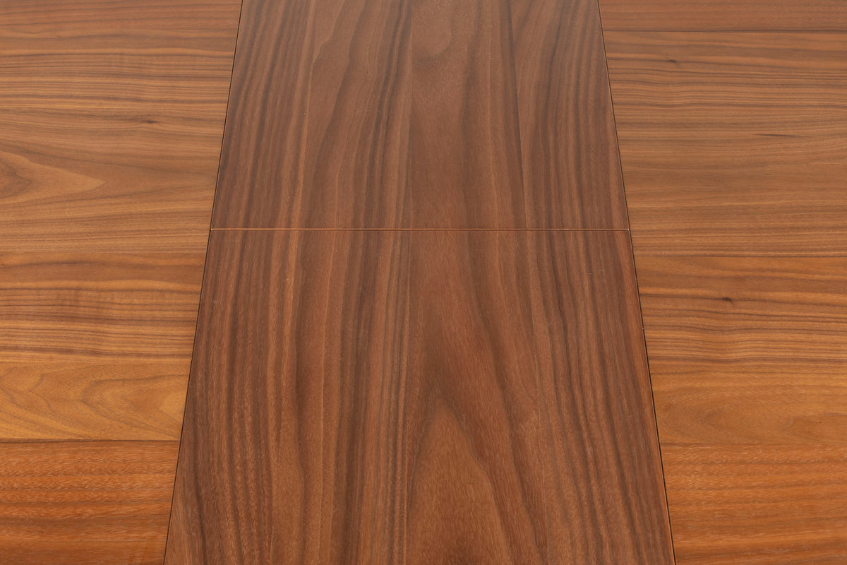 Twist Tisch rund 120/160 Nussbaum in Braun präsentiert im Onlineshop von KAQTU Design AG. Esstisch ist von Zuiver