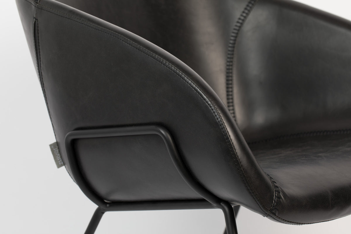 Lounge Sessel Feston in Schwarz präsentiert im Onlineshop von KAQTU Design AG. Sessel mit Armlehnen ist von Zuiver