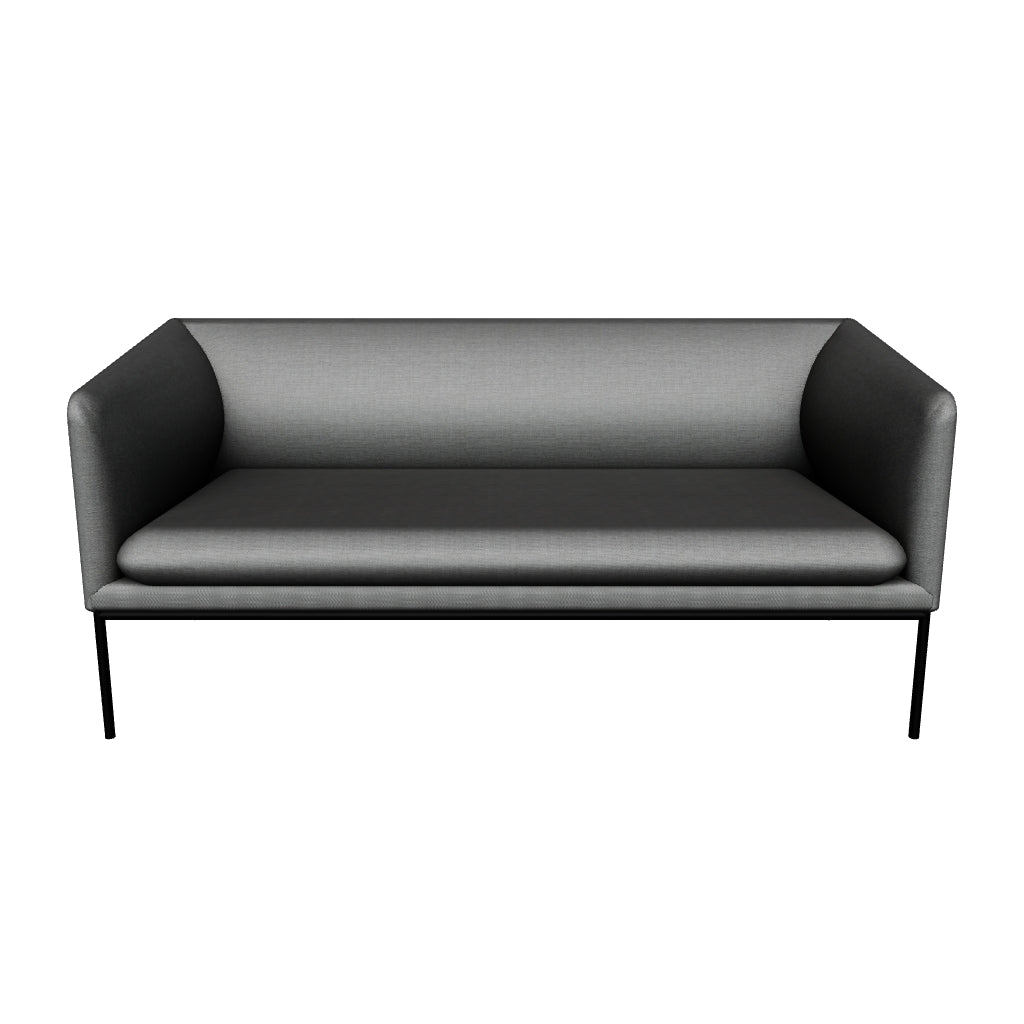 Elegantes Sofa mit wendbarem Kissen, skulpturalem Design und schwebenden Metallbeinen für zeitlose Eleganz.