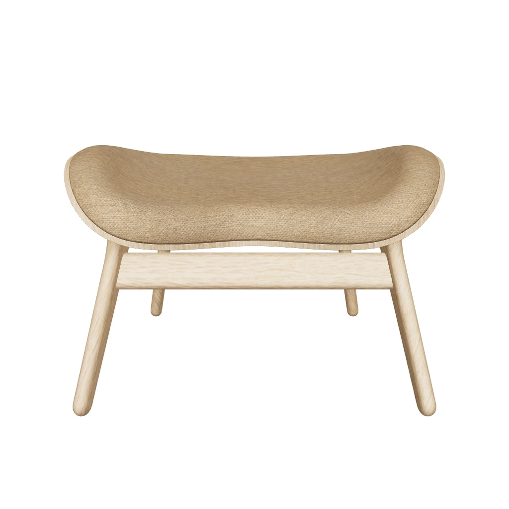 Eleganter A Conversation Piece Ottoman in warmem Sugar Brown, perfekt für entspannte Momente und stilvolle Einrichtungsideen.