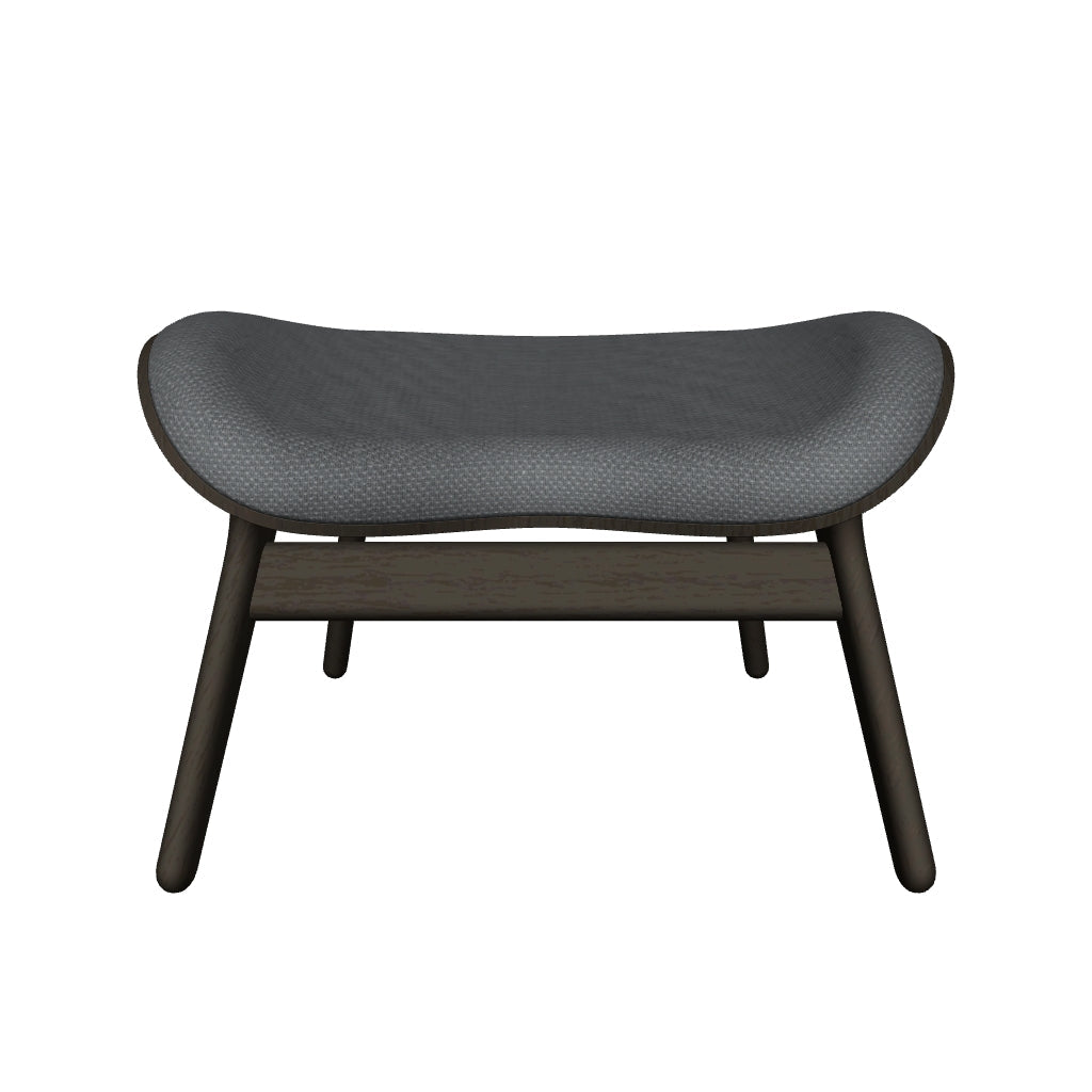 Eleganter A Conversation Piece Ottoman in der Farbe Shadow, ideal für stilvolle Akzente und kreative Gestaltung in modernen Wohnräumen.