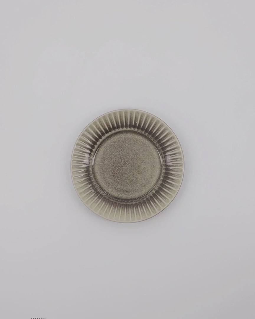 Stilvoller HDPleat Kuchenteller von House Doctor in Grau/Braun.